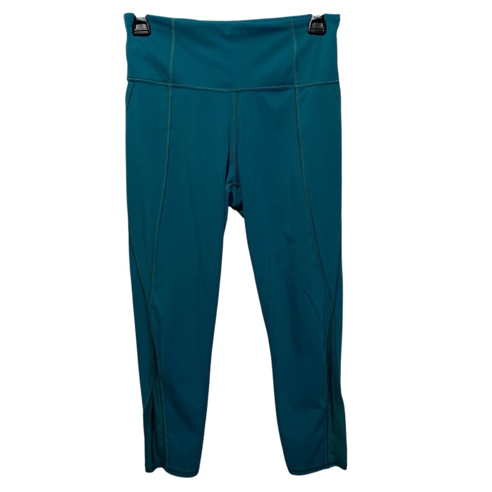 Athleta Lighting Capri Leggings Stash Pockets Mesh Reflective Strip Teal small